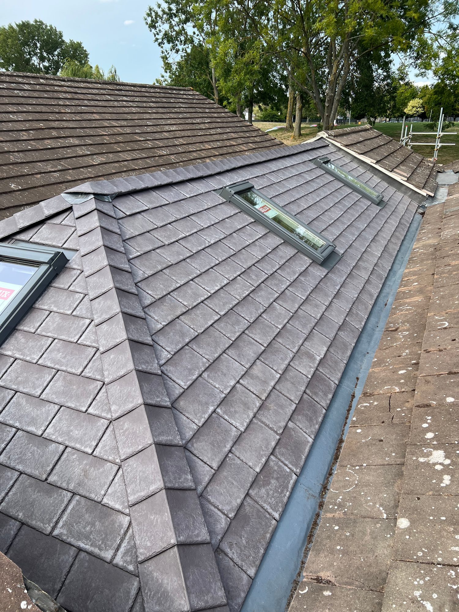 Completed - The completed conservatory roof with new tiles, roof windows and leadwork
