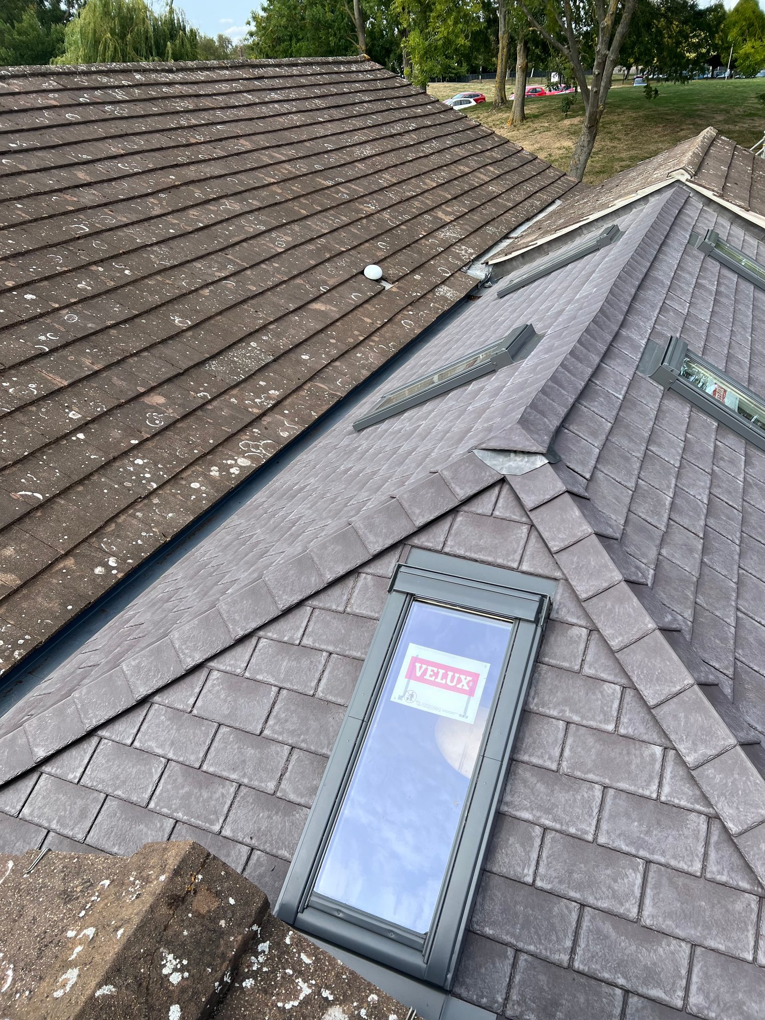 Completed - The completed tiled conservatory roof with new roof windows and leadwork