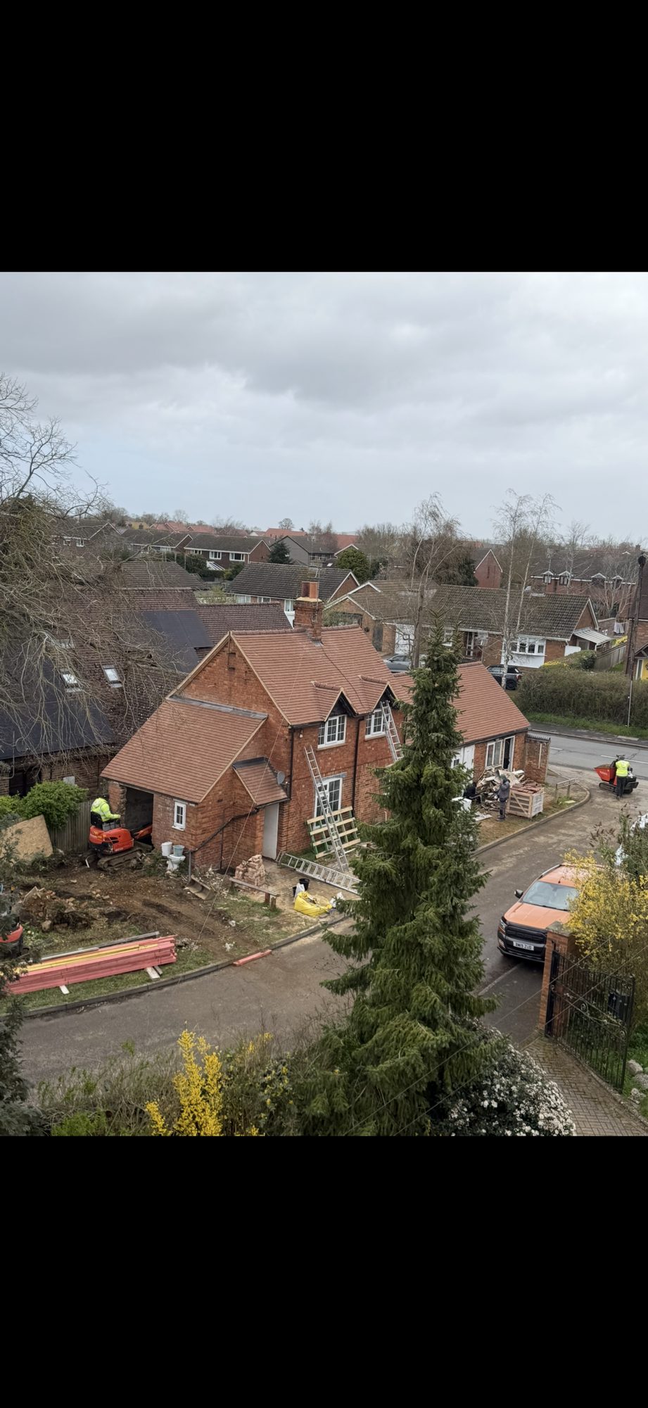Period brick property with newly tiled roofs across the main house and adjoining structures